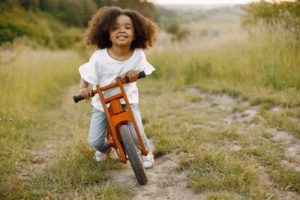 Little girl on a bike